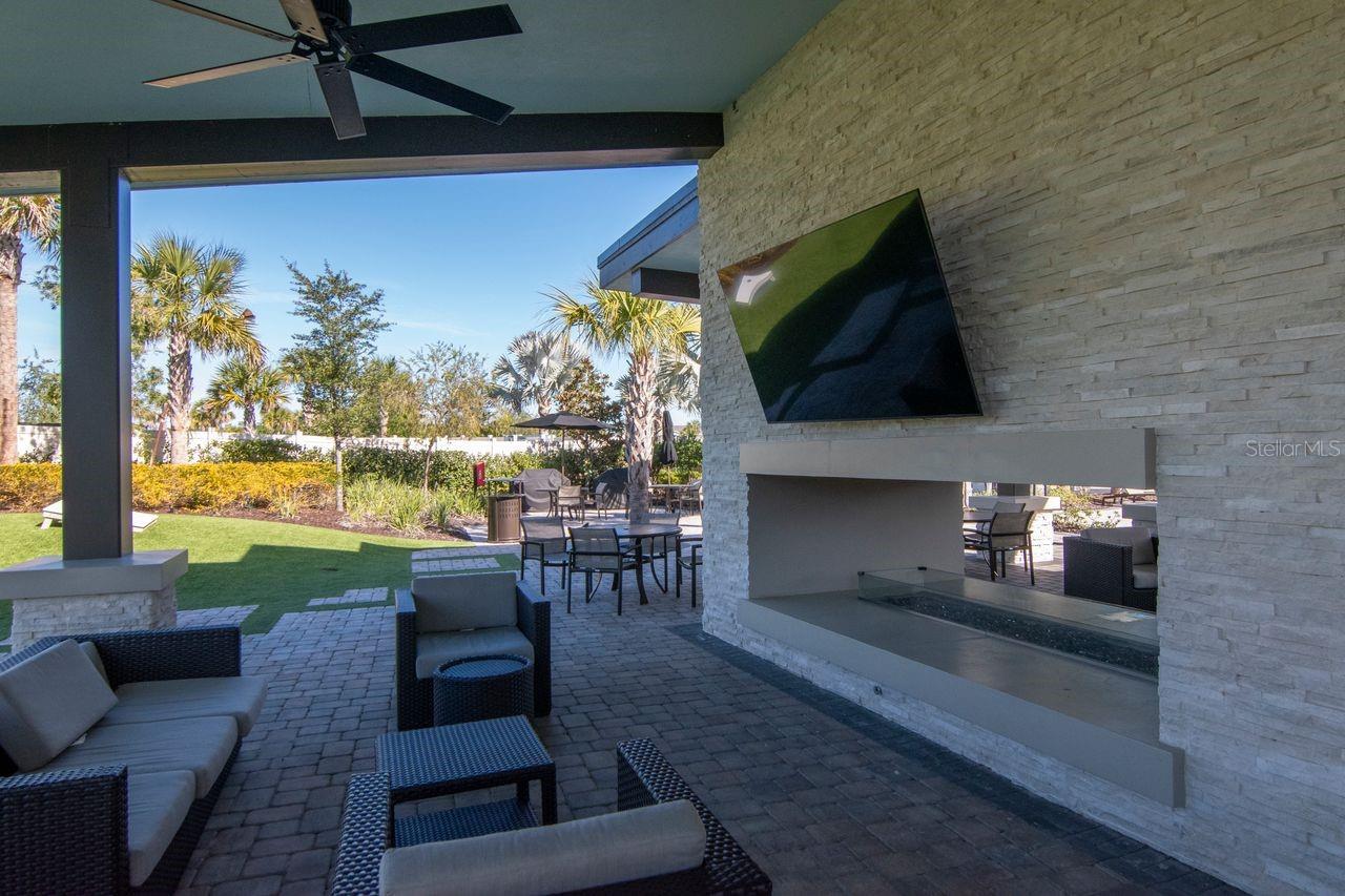 River Landing Resort-Style Amenities - Outdoor Gathering Area with Fireplace and TVs