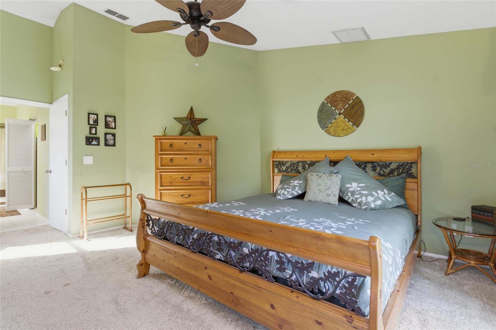 Primary Bdrm with Ensuite Bath, with sliders to Pool