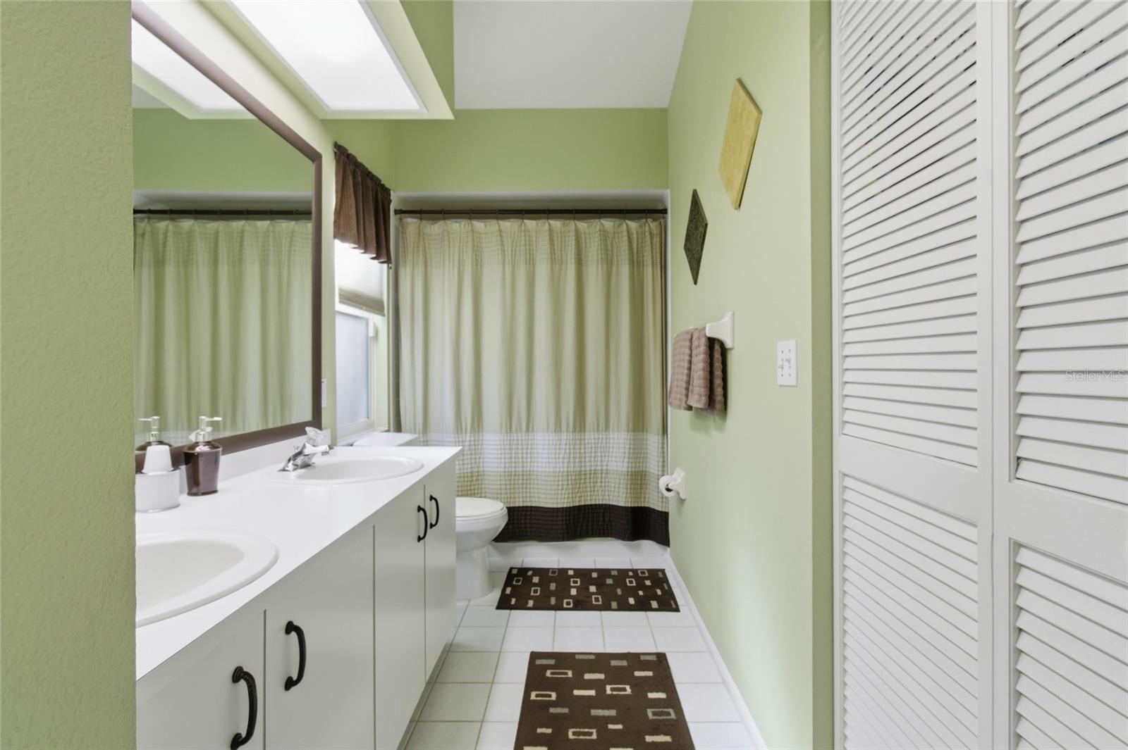 Primary Ensuite Bath with Dual Vanity