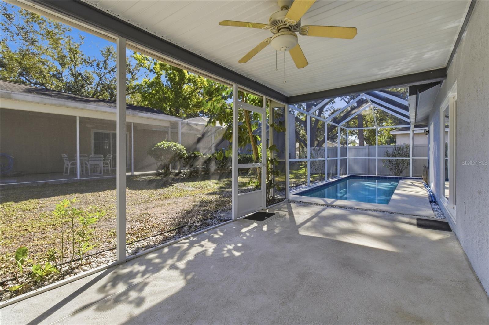 Screened Lanai and 25' x 8' Pool with Pool Sweep and safety fencing