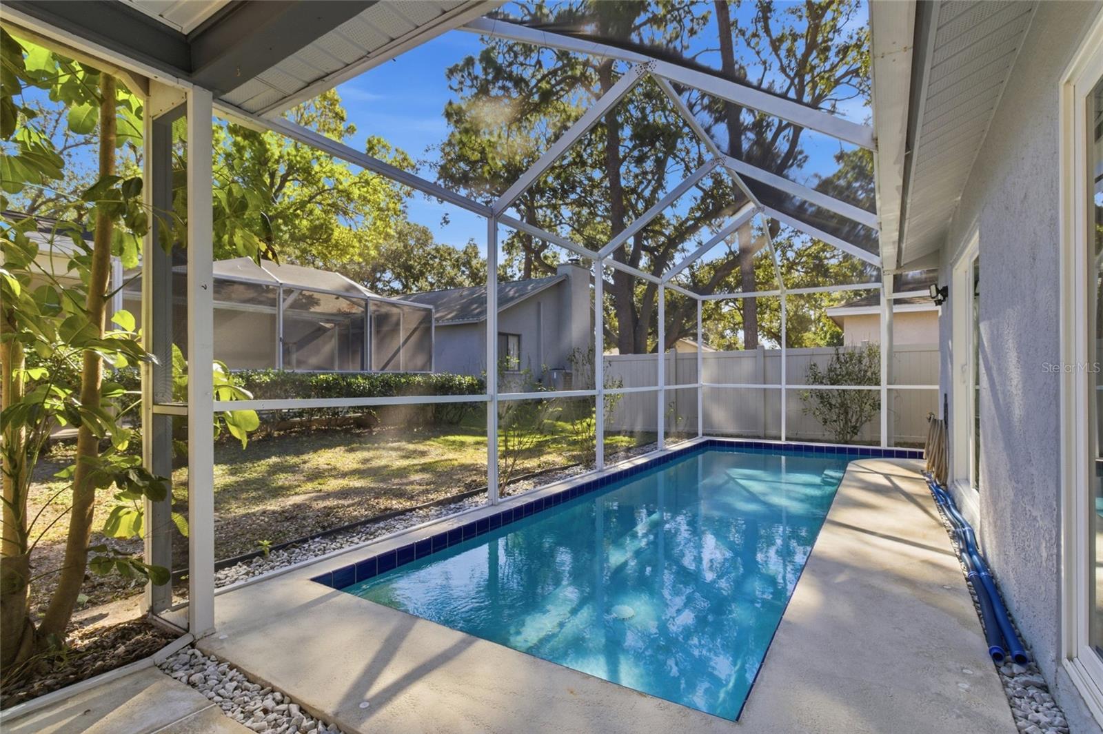 Screened Lanai and 25' x 8' Pool with Pool Sweep and safety fencing