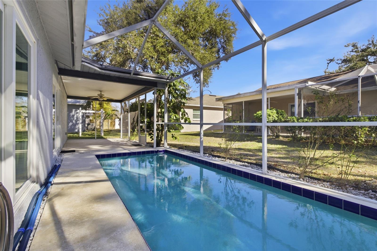 Screened Lanai and 25' x 8' Pool with Pool Sweep and safety fencing