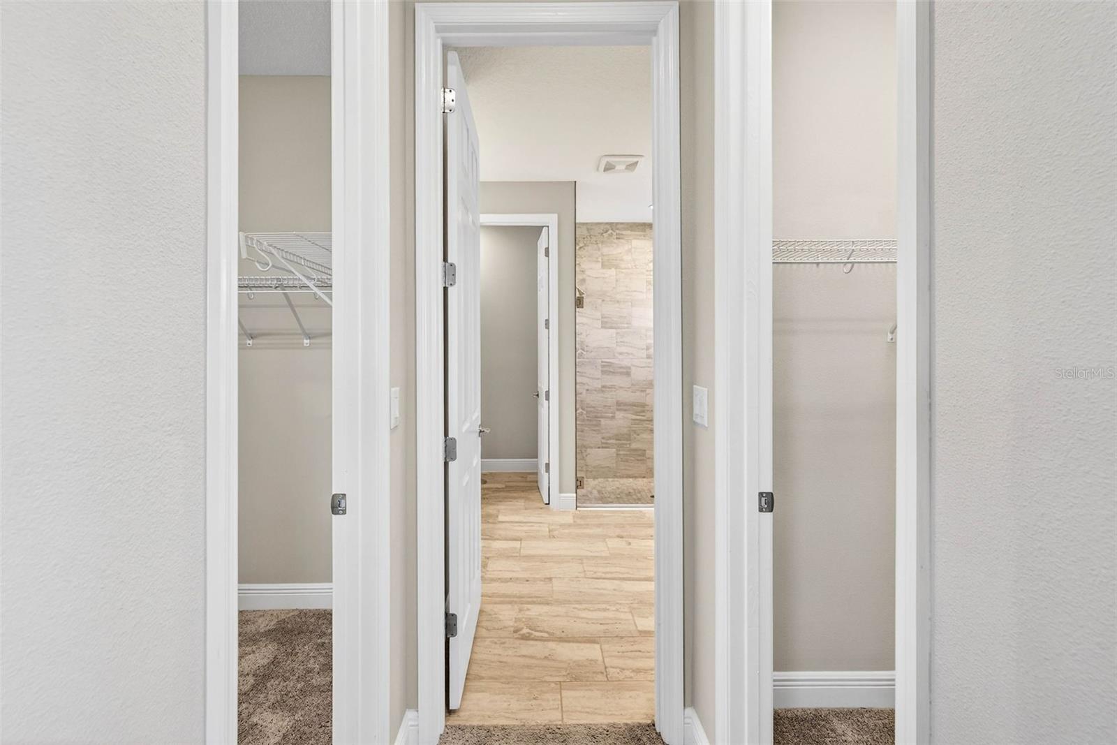 Primary bedroom dual closets