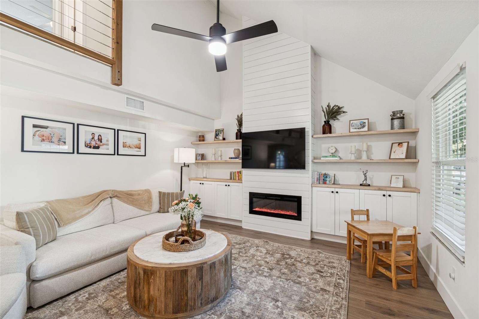 Living Room w/ Built-ins and Electric Fireplace
