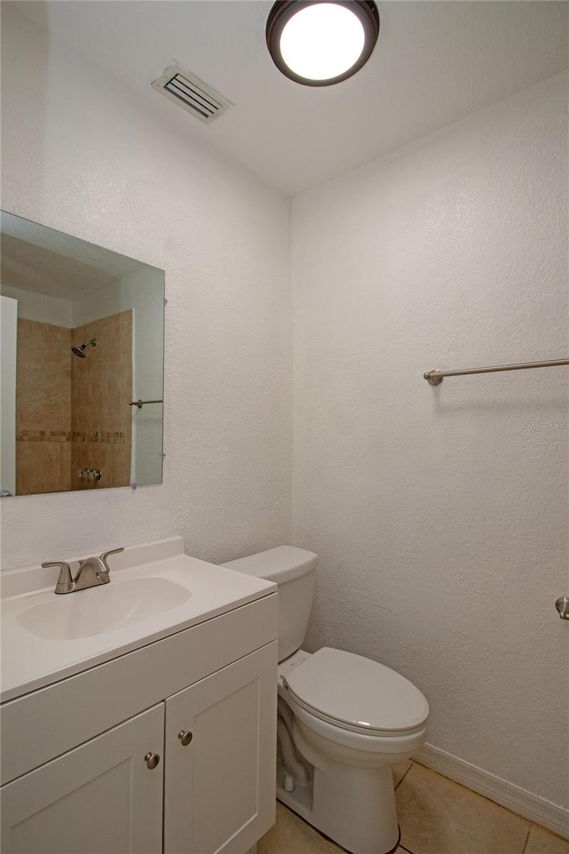 Primary en suite bath with walk in shower.