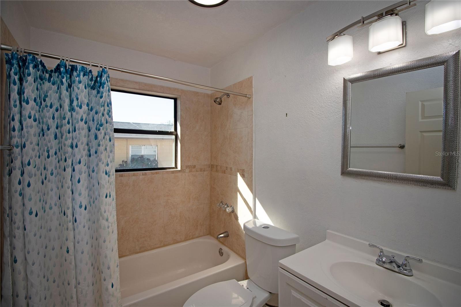 Guest bath with tub