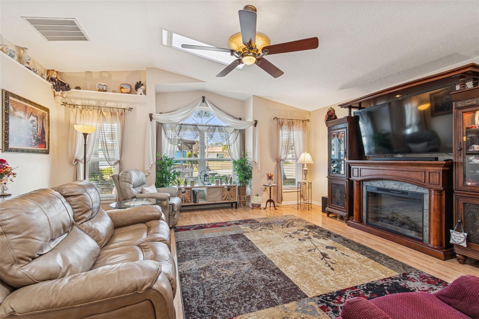 Great Room w/ Vaulted Ceilings and Skylights