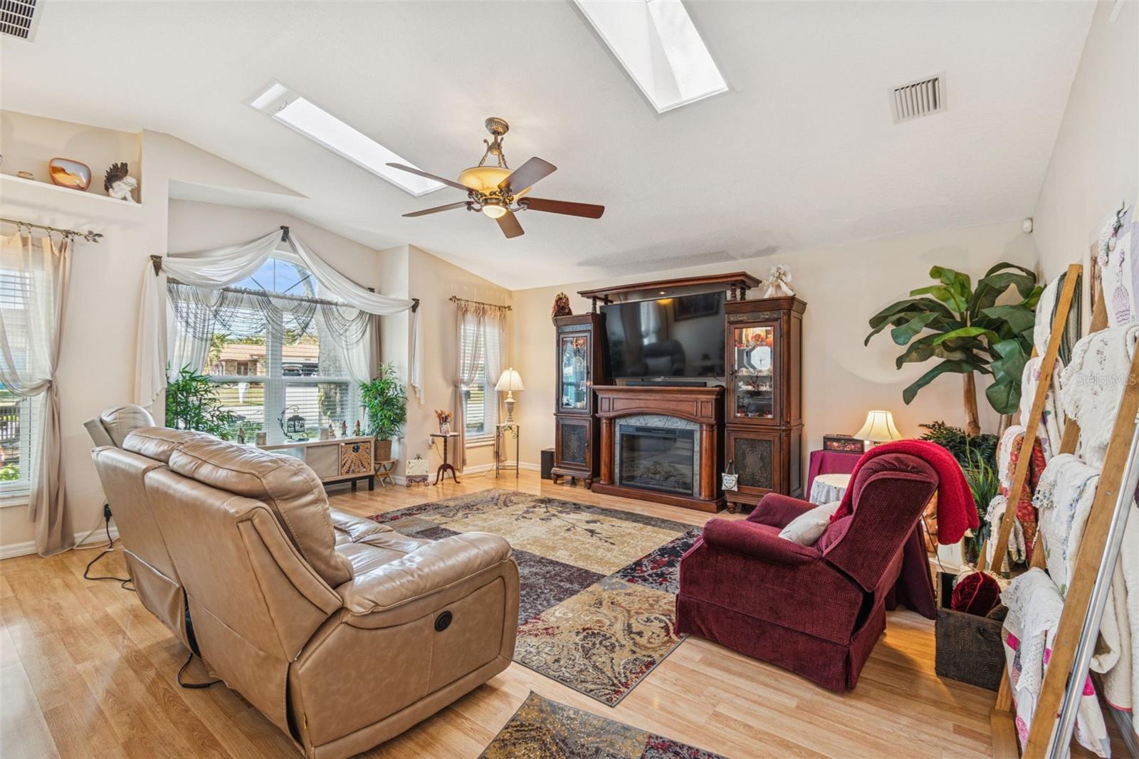 Great Room w/ Vaulted Ceilings and Skylights