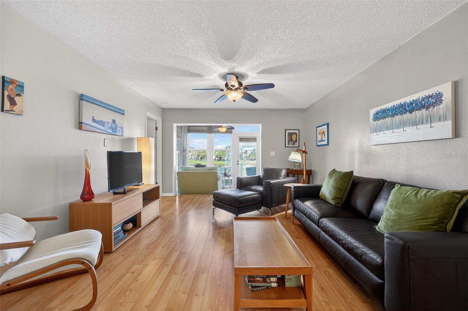 Living room is spacious and lead out to your enclosed SunRoom