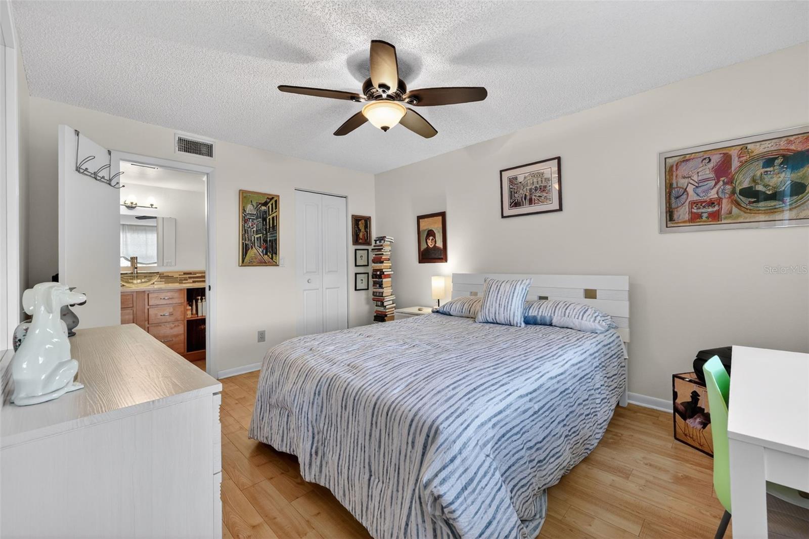 The primary bedroom is bright and has its own walk in closet and En-Suite