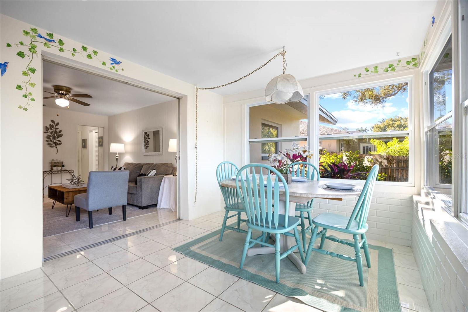 At the back of the home is this amazing Florida/Sun Room and you may just find yourself spending most of your time here!