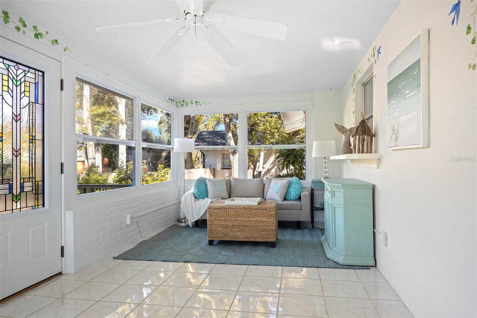 On the other end of the Florida/Sun room is space for more relaxing.    Maybe you unwind at the end of the day and catch a sunset?