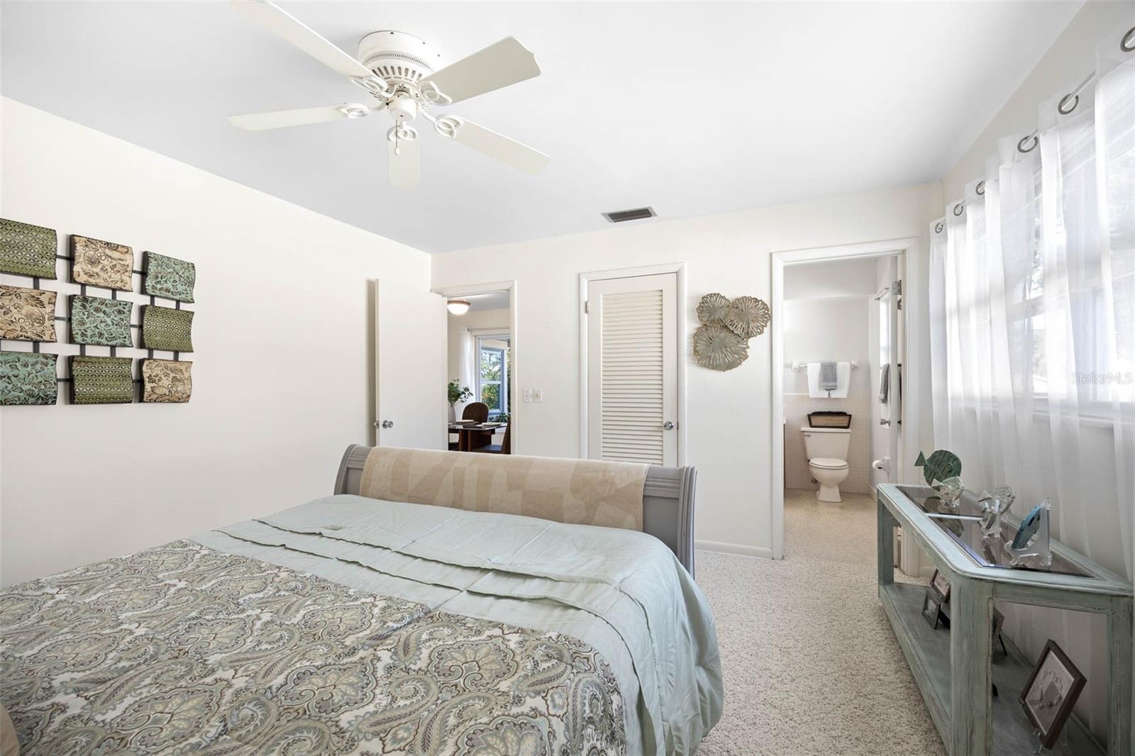 Alternate view in the Primary Bedroom.    There is a walk in closet as well as the ensuite bathroom.