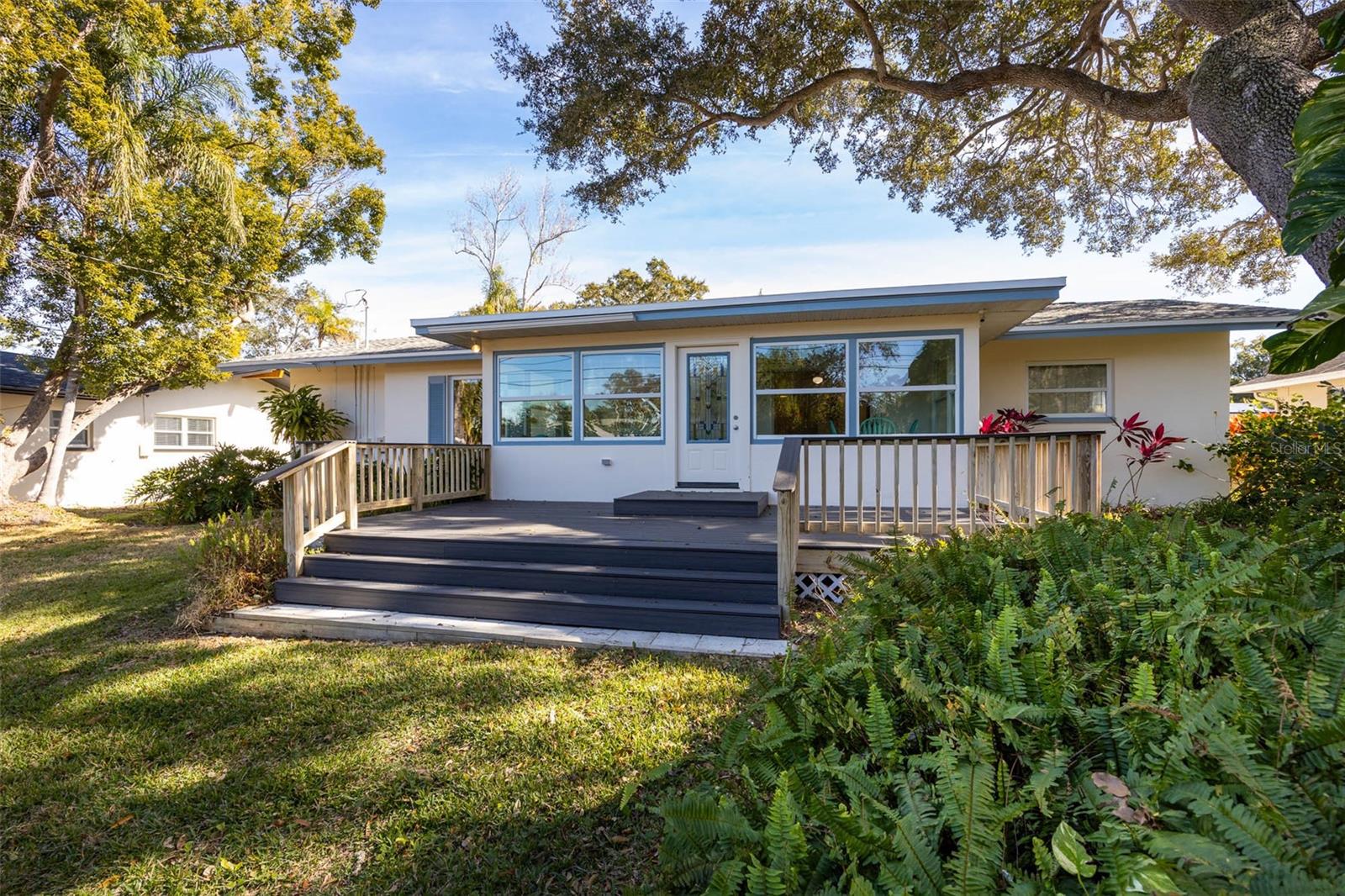This large deck at the back of the home will be a great place to watch the birds and squirrels in action!