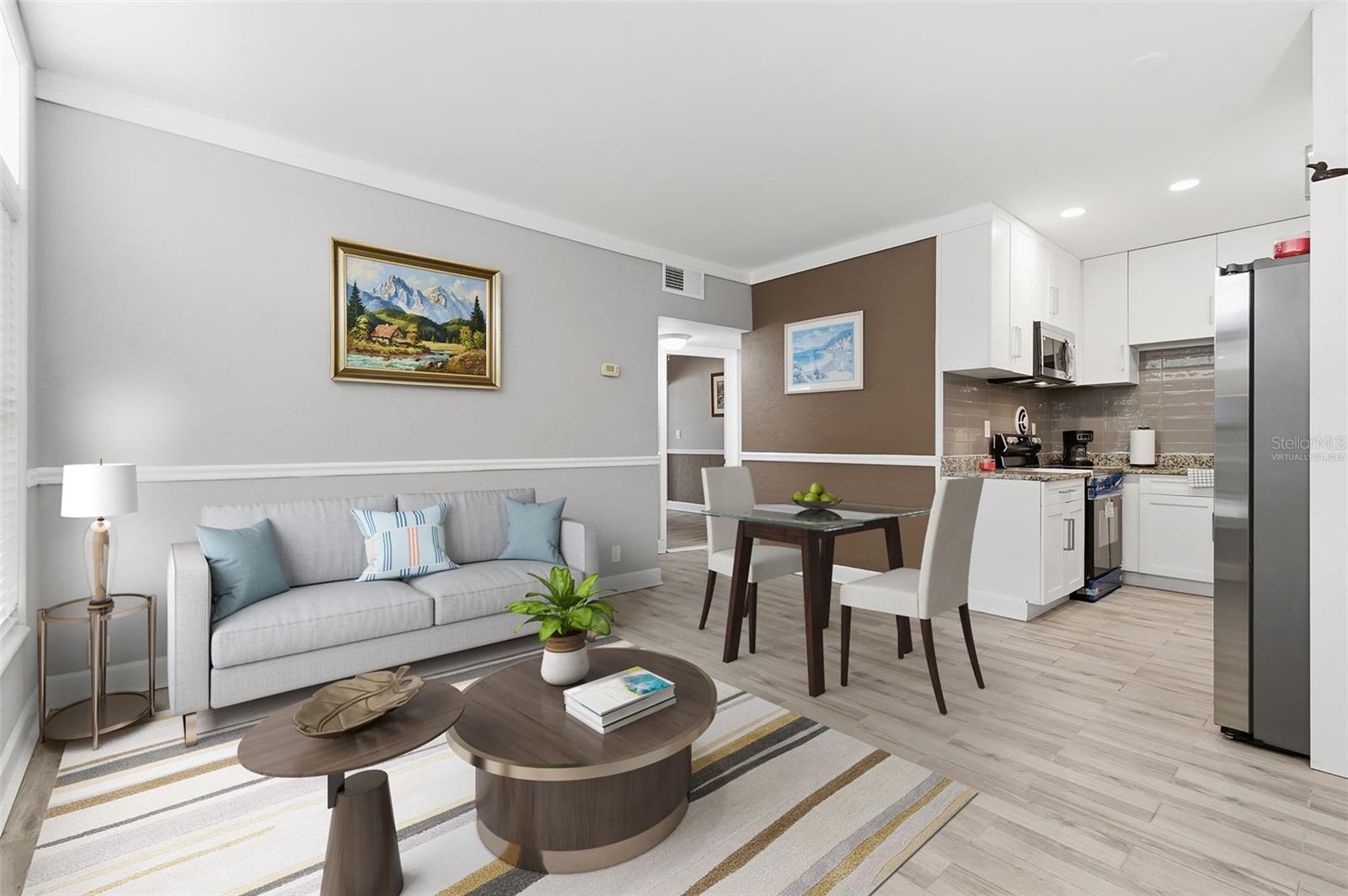 Virtually Staged Photo of the Combined Living and Dining Areas