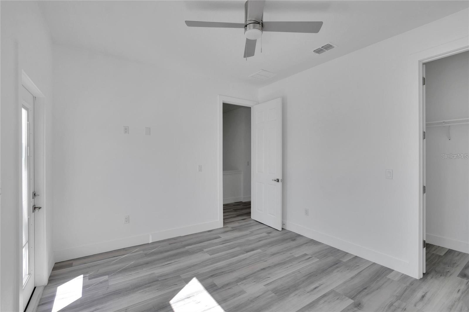 Bedroom 3 Walk in Closet, entrance & balcony