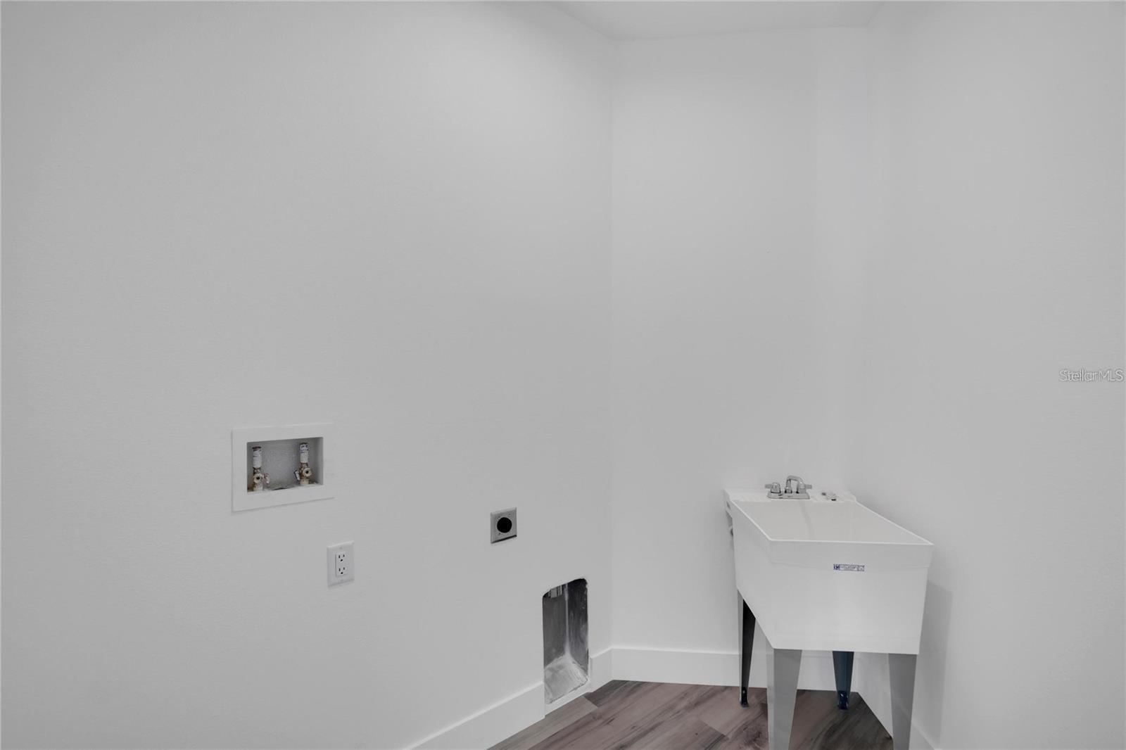 Large Laundry Room with Utility Sink