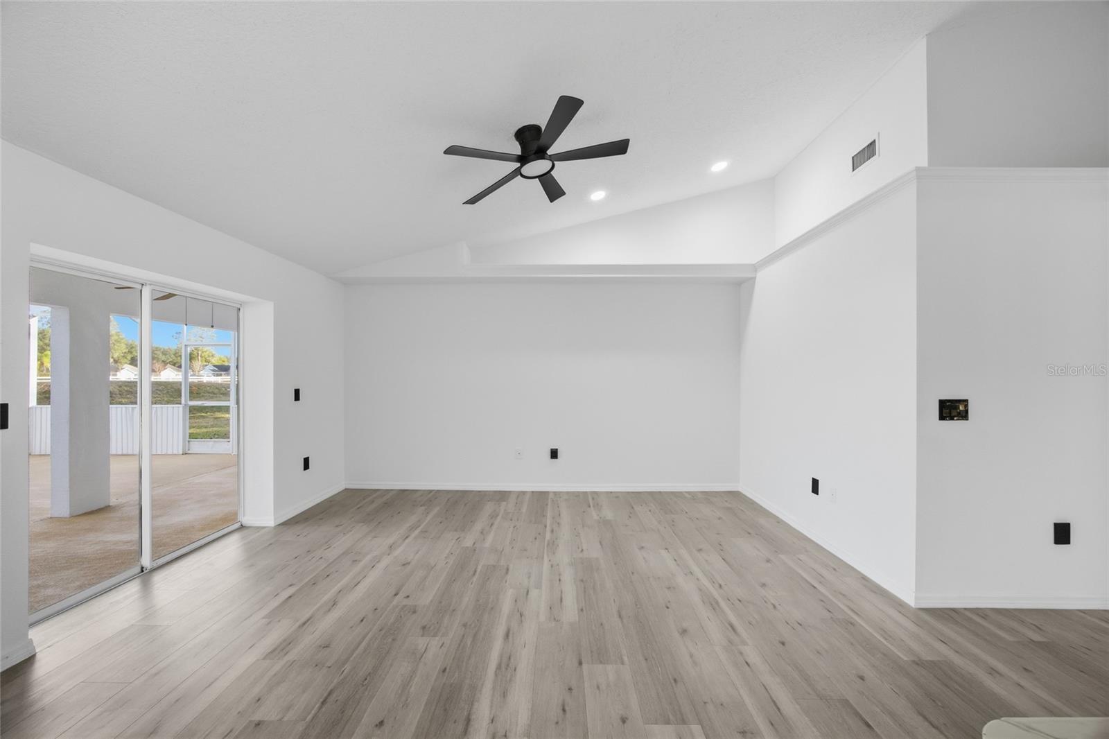 Those sliding doors showcase the beautiful pool!