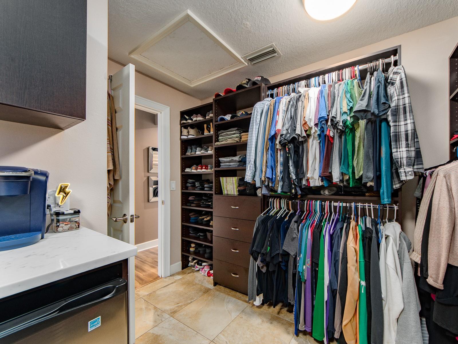 PRIMARY BEDROOM WALK IN CLOSET