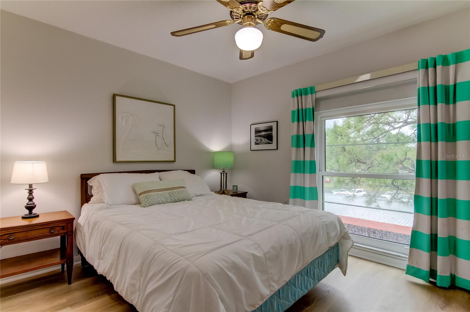 40. Bedroom #2 (9.8' x 11.2') Includes Large Closet, Ceiling Fan, Brand New Flooring, Great Lighting!