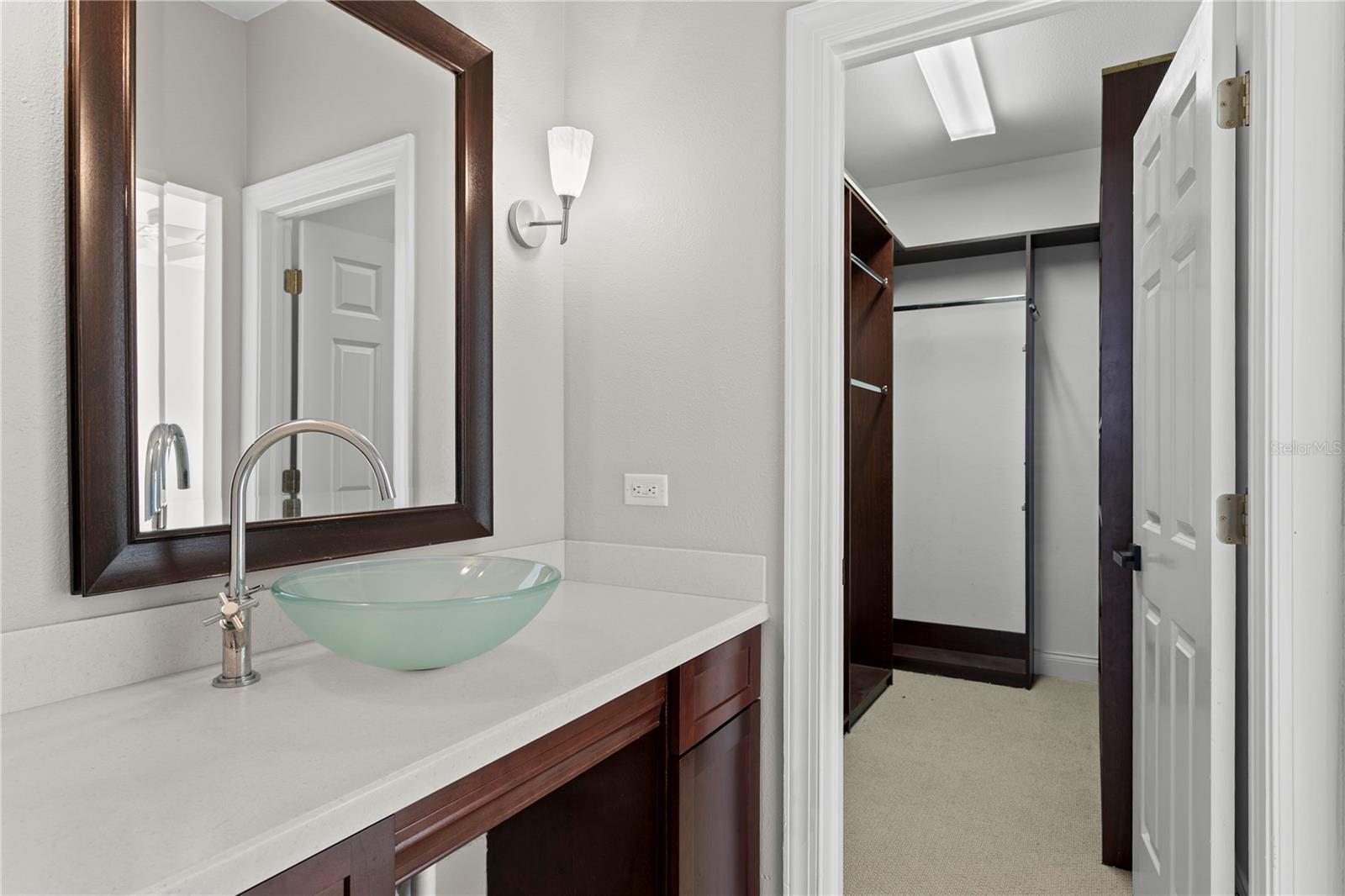The second and third bedrooms share a Jack-and-Jill bath with double sinks.