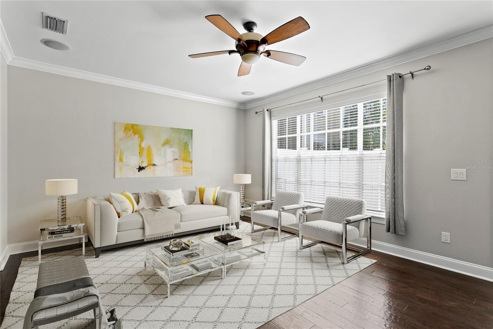 Virtually staged image of the nicely appointed living room