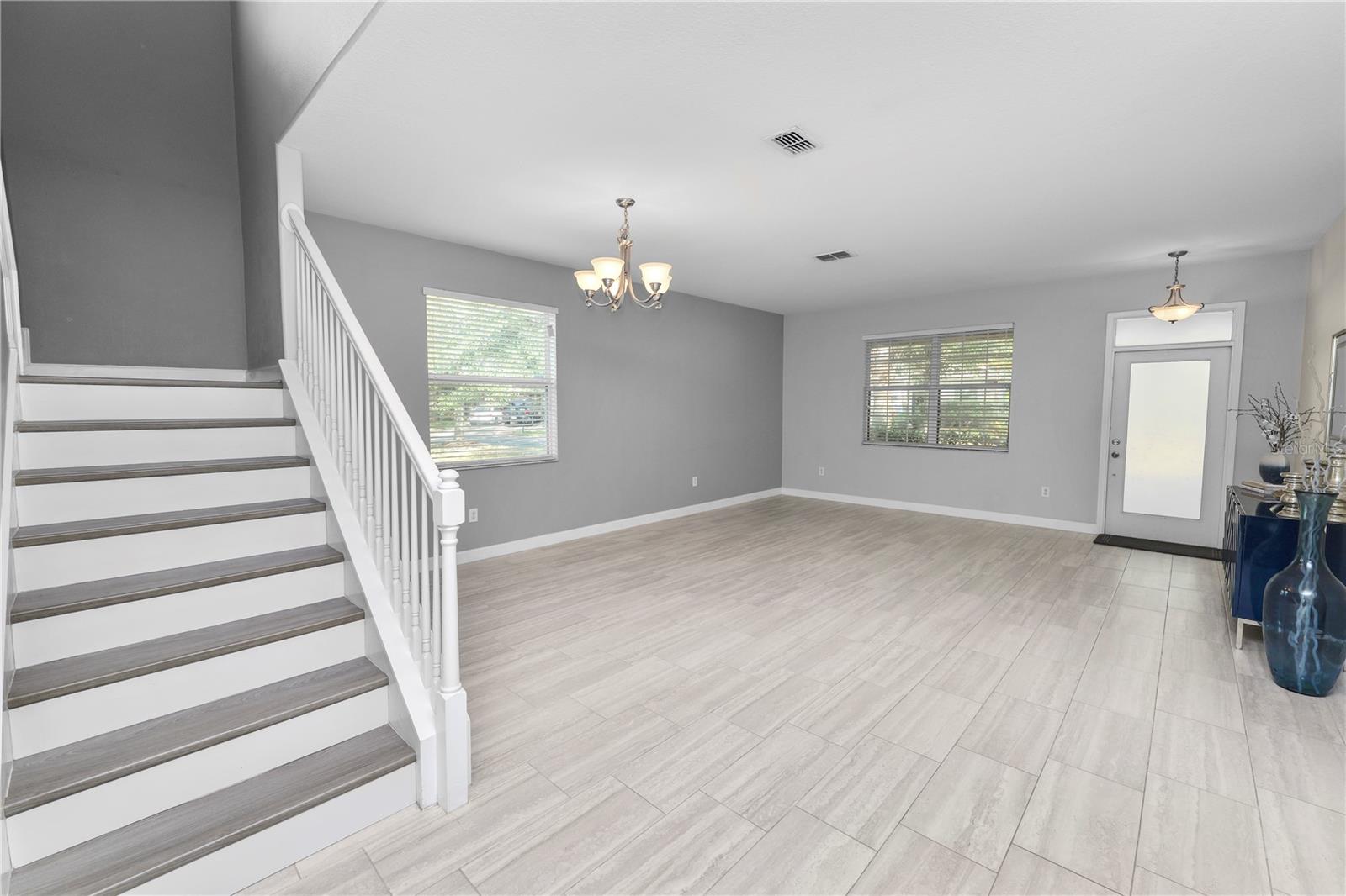 view of living room area and stairs
