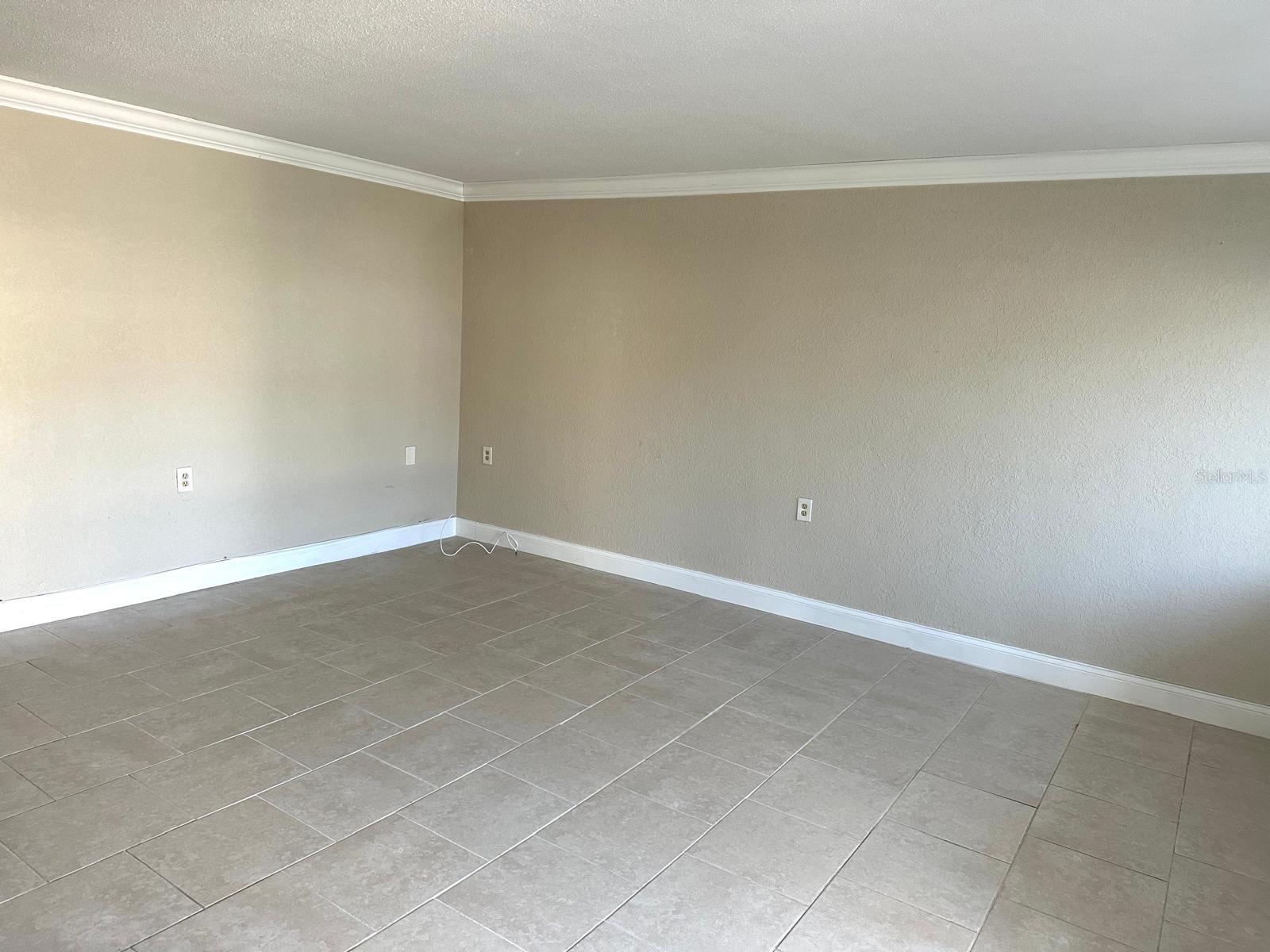 VIEW OF LIVING ROOM FROM THE FRONT DOOR