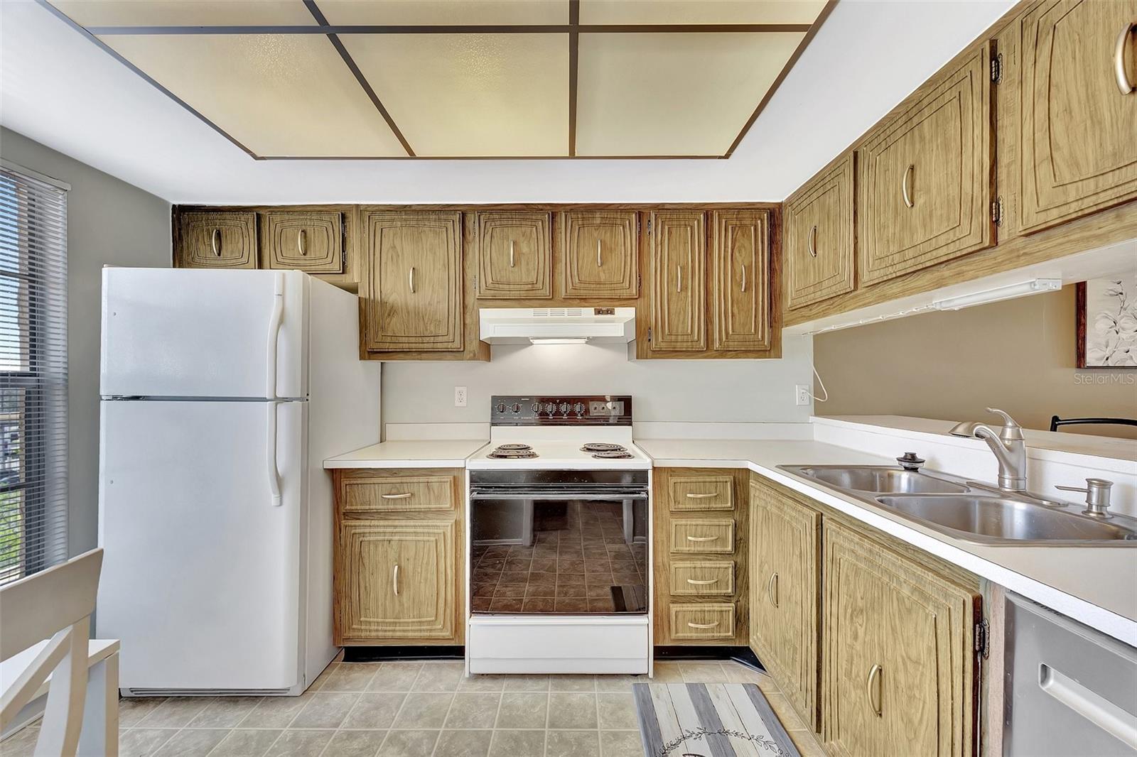 Kitchen has a window to let in light