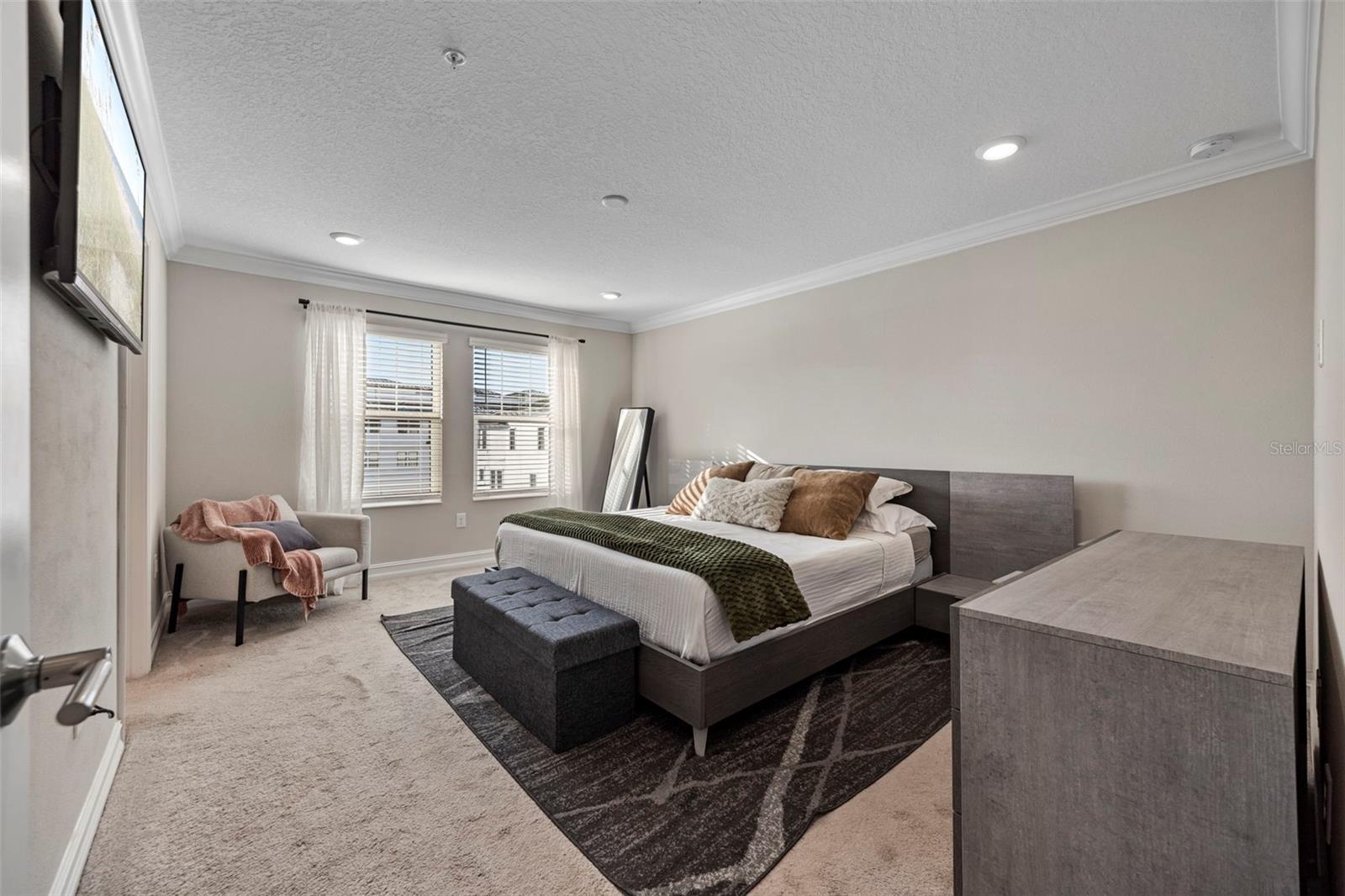 Back Primary Bedroom with a king sized bed