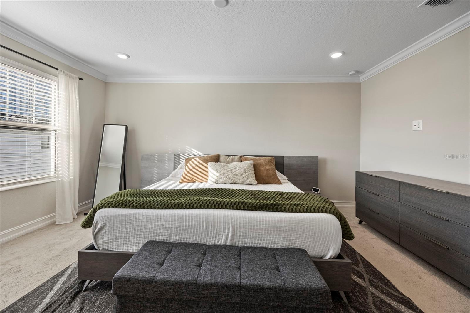 Back Primary Bedroom with a king sized bed