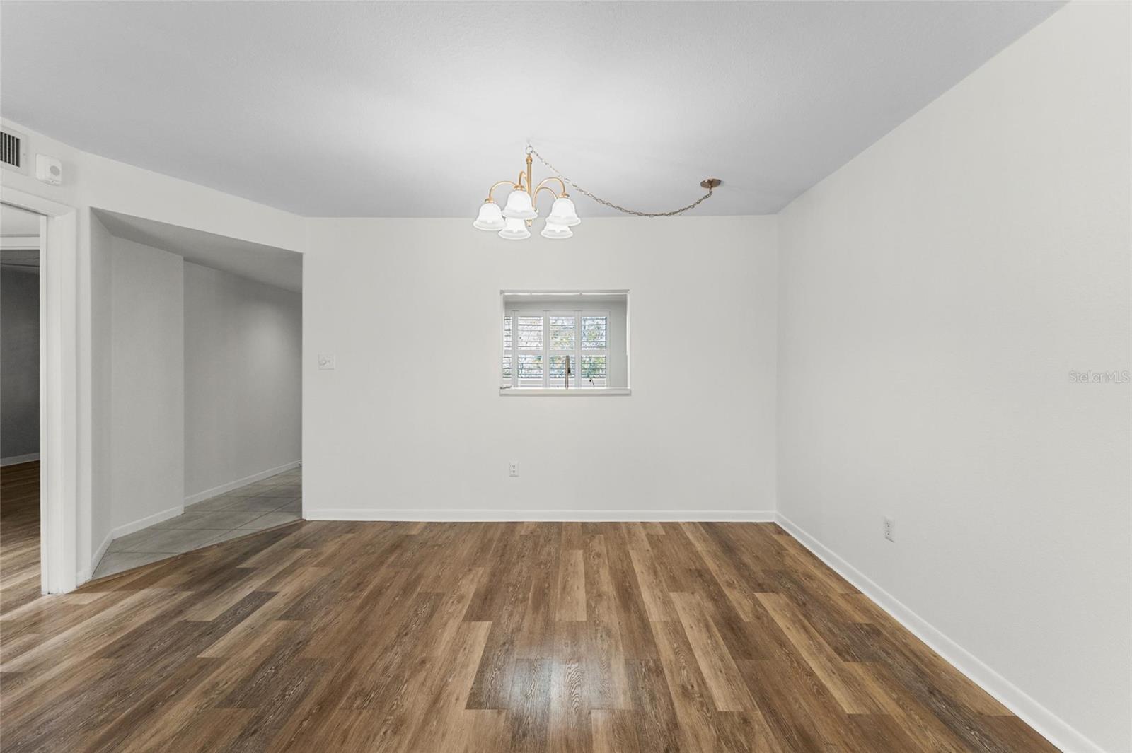 Dining area looking to kitchen pass thru