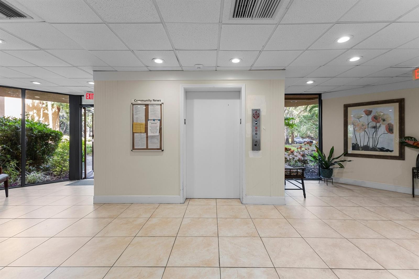 Secured Lobby with glass elevator