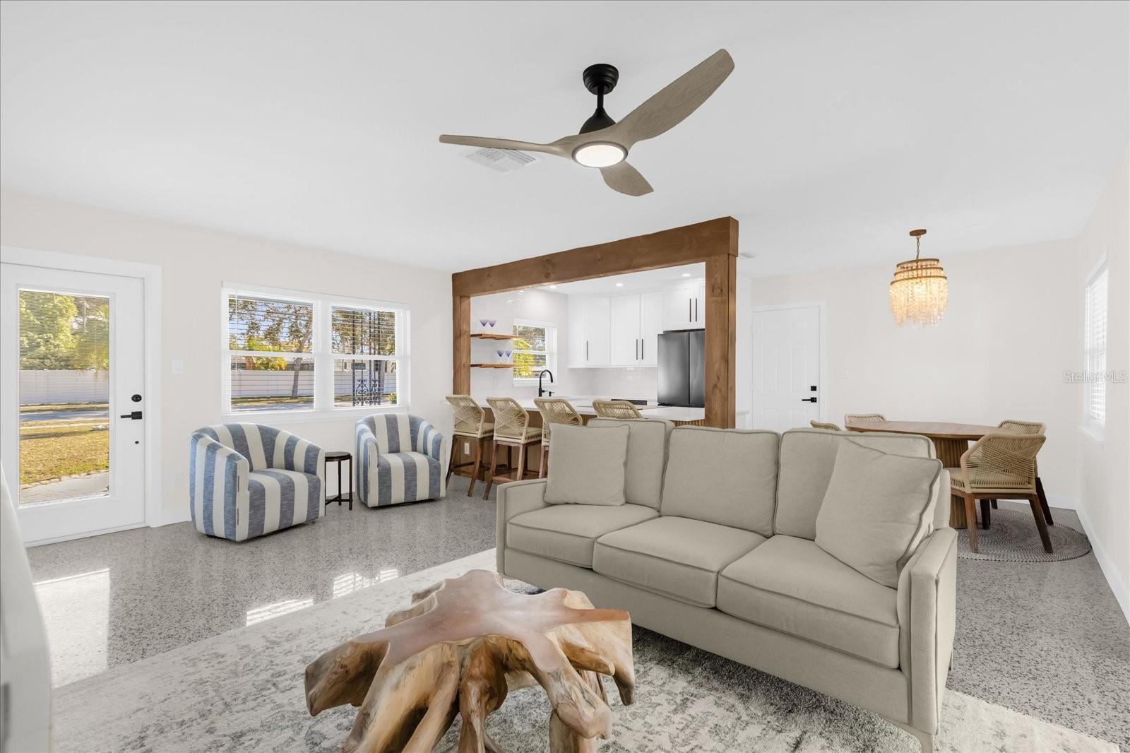 Front door, living area and kitchen/dining.