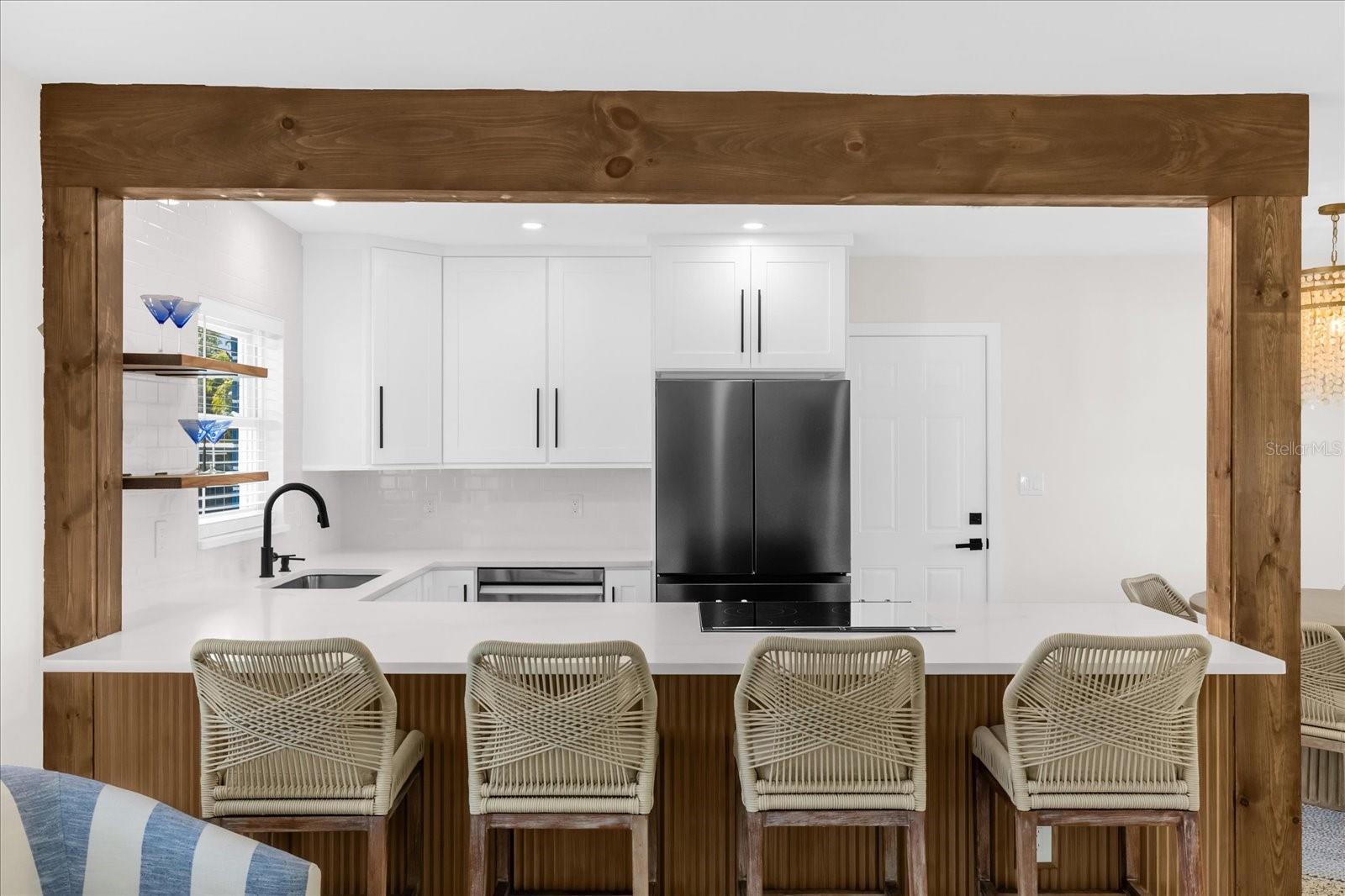 View into kitchen from living room.