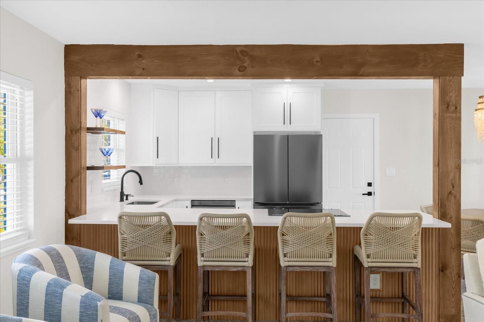 Beautiful wood craftsmanship with matching floating kitchen shelves