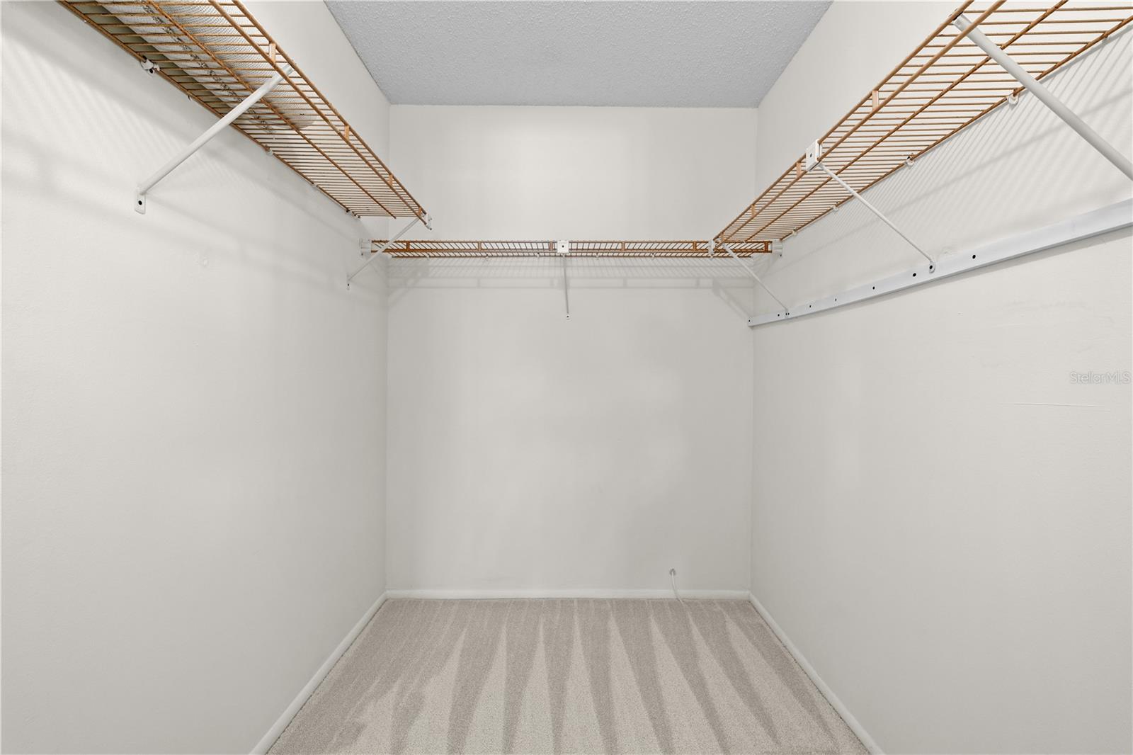 Large walk in closet in primary bedroom