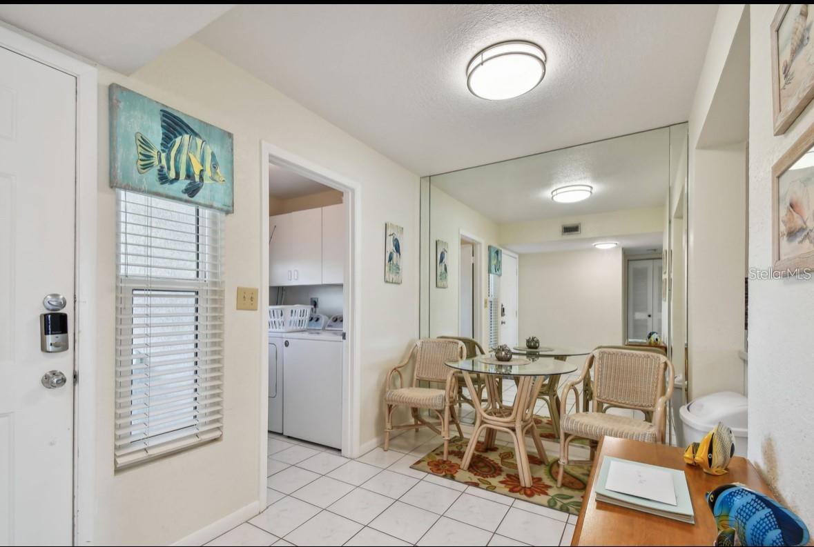 dinette area in kitchen with separate laundry room