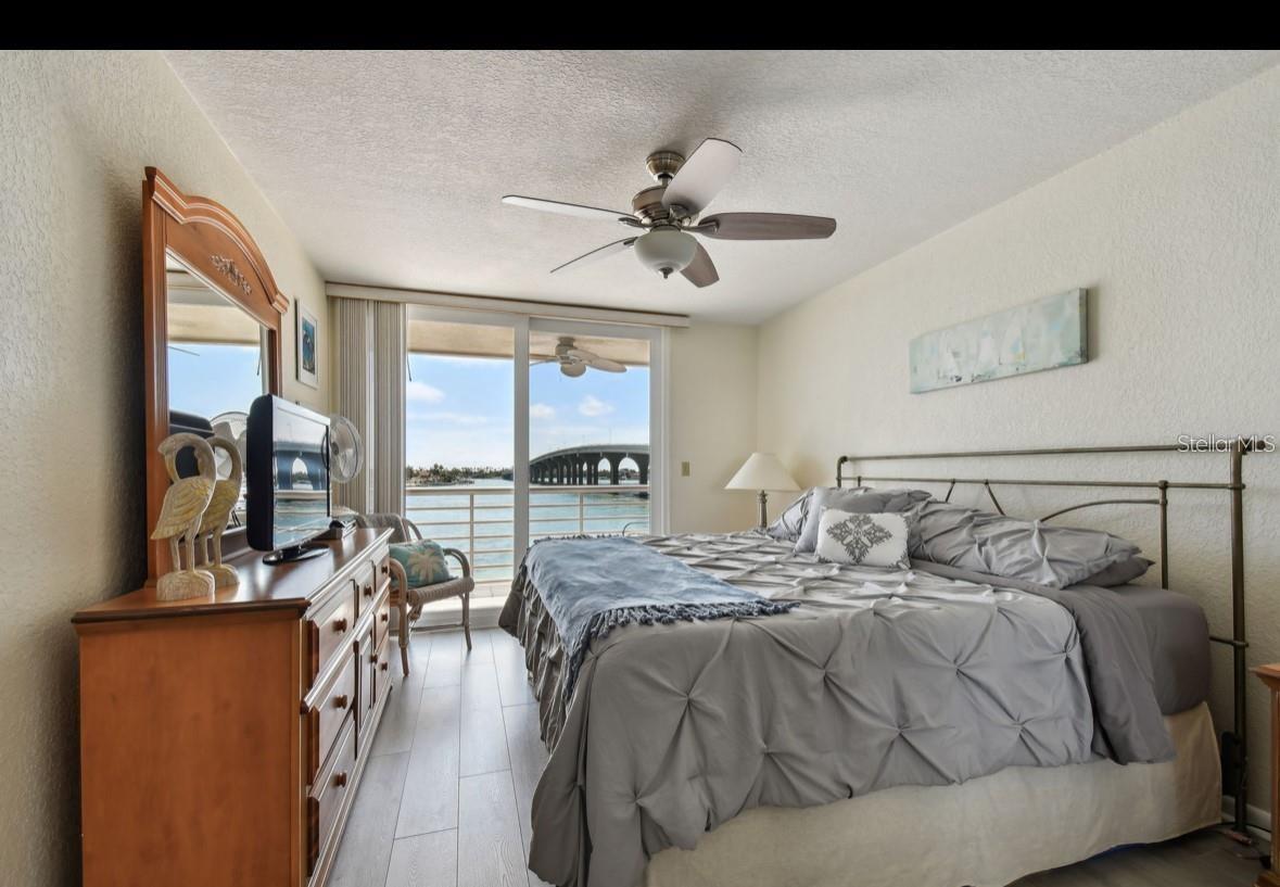 primary bedroom looking towards large balcony and intracoastal