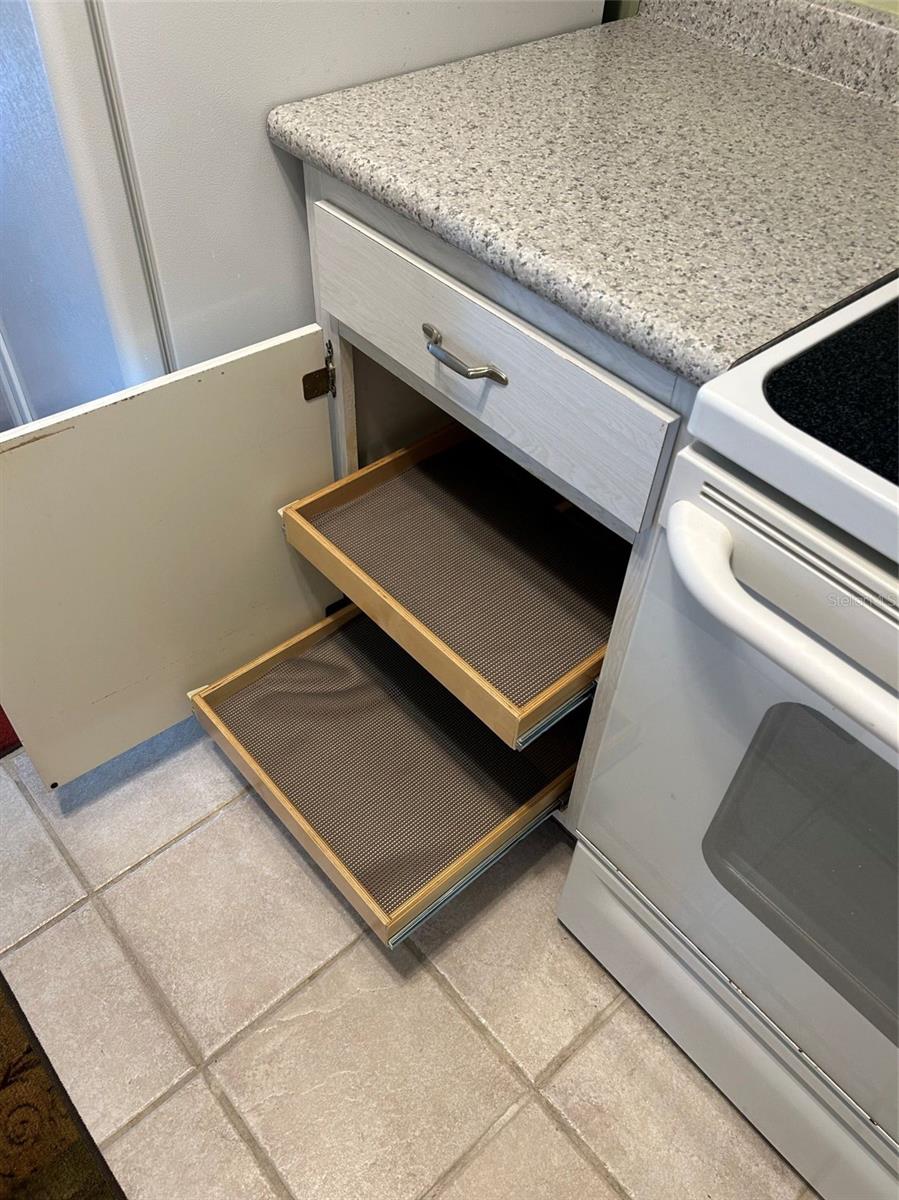 All lower cabinets have shelf genies