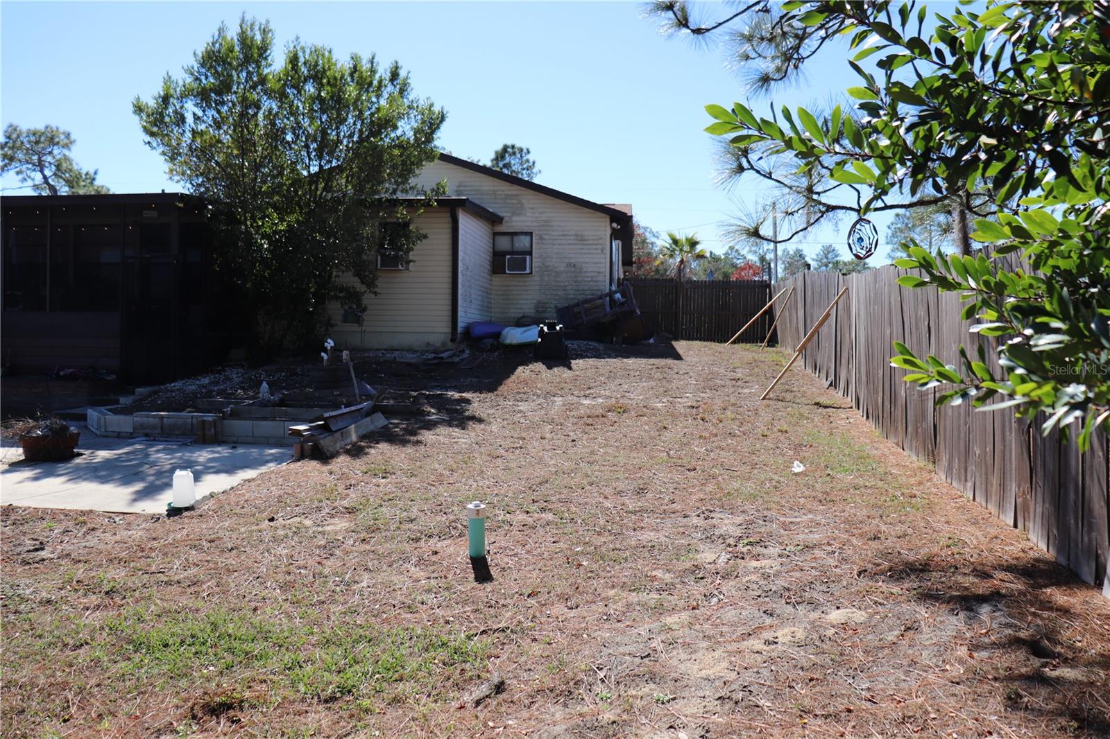 LEFT SIDE YARD FROM BACK