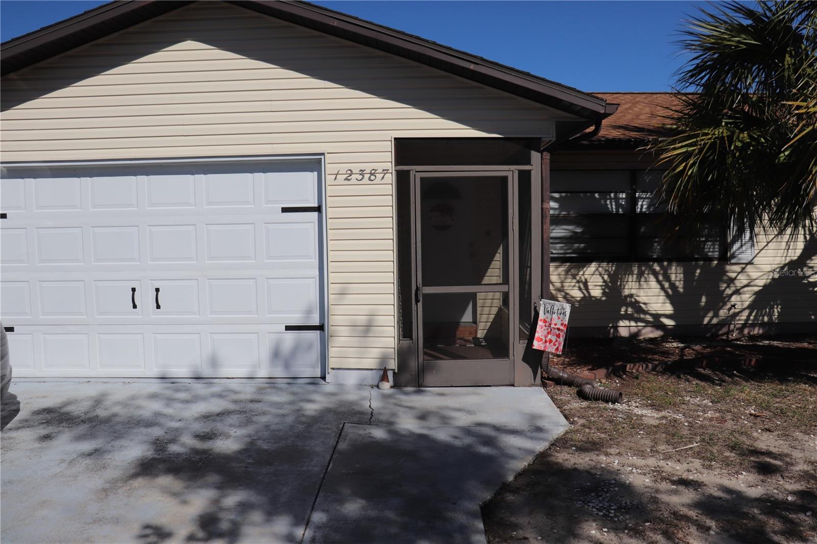 FRONT SCREENED IN PORCH ENTRANCE