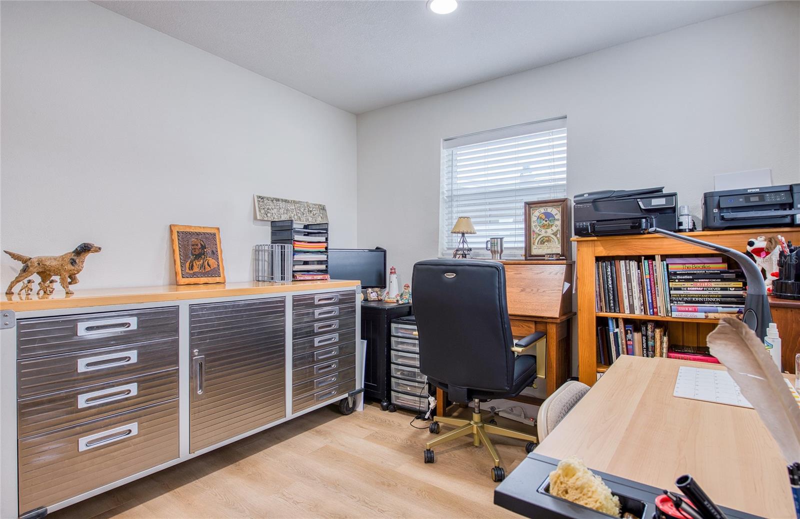 Bonus room being used as extra office and craft room