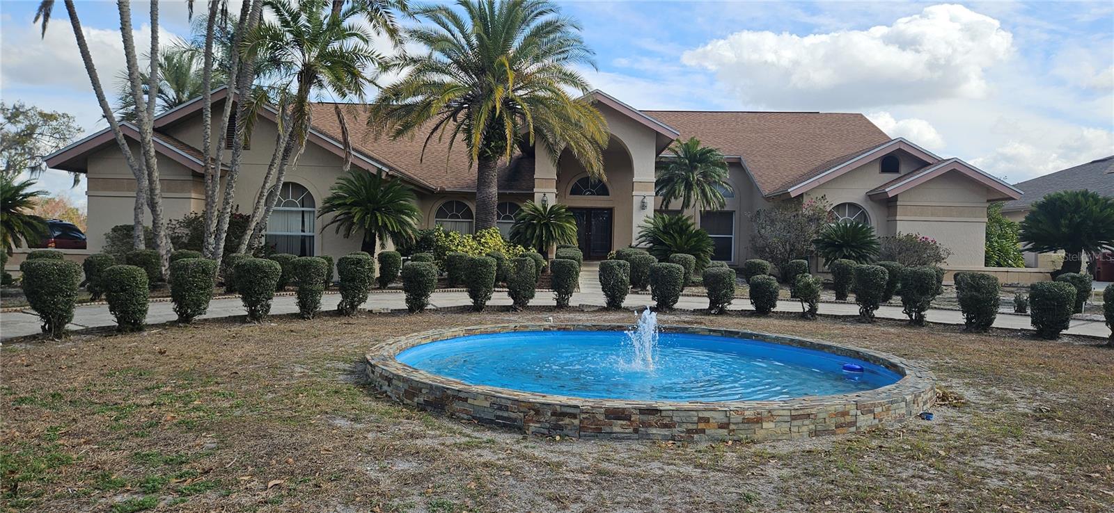 Large Circular Driveway with Fountain, also Side Entry driveway