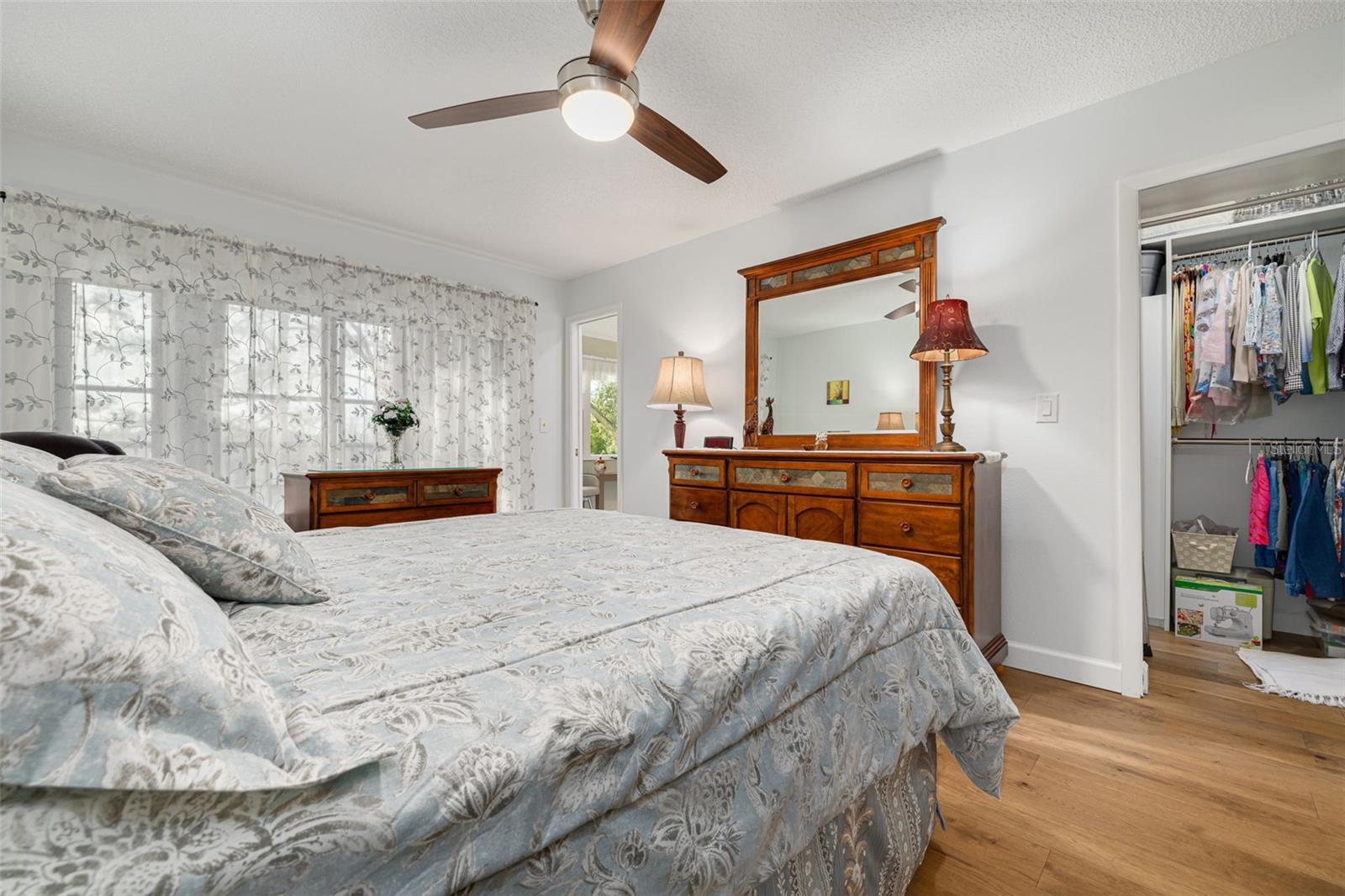 Primary bedroom with walk-in closet