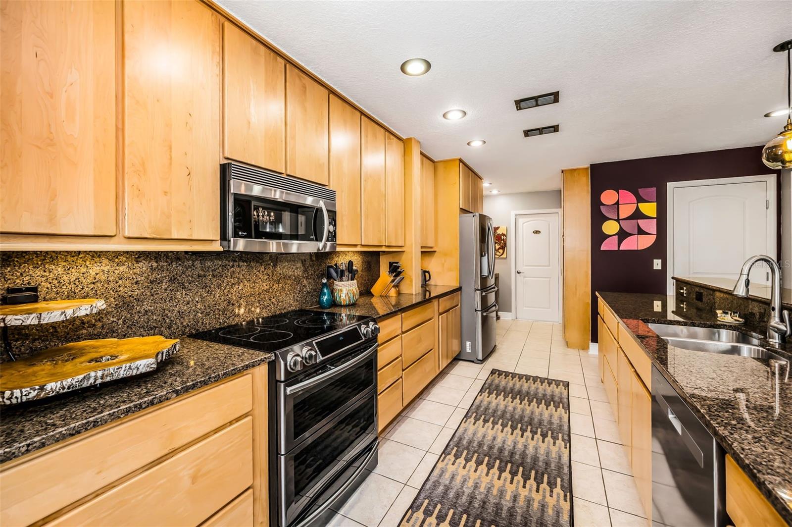 Captivating Kitchen, gleaming granite countertops