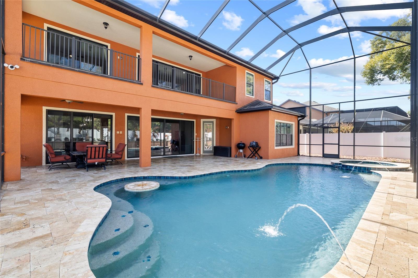 Saltwater Pool and Heated Spa with travertine stone patio