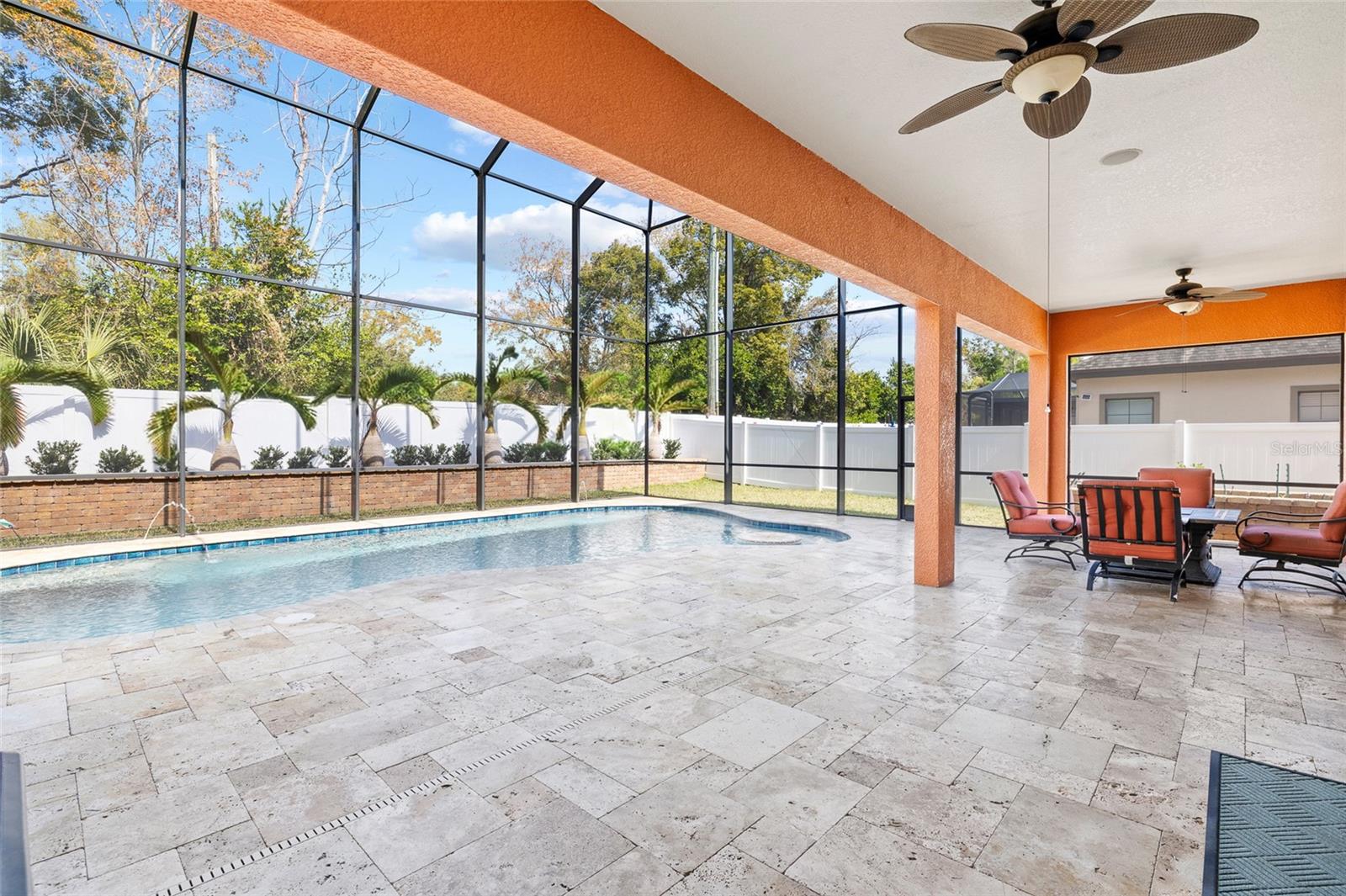 Lanai with travertine stone patio