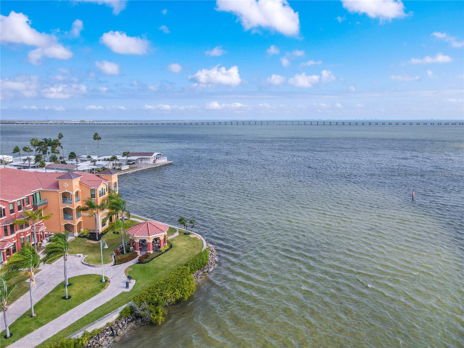 An aerial perspective showcases the prime waterfront setting of The Grand Bellagio at Baywatch, nestled along Old Tampa Bay.