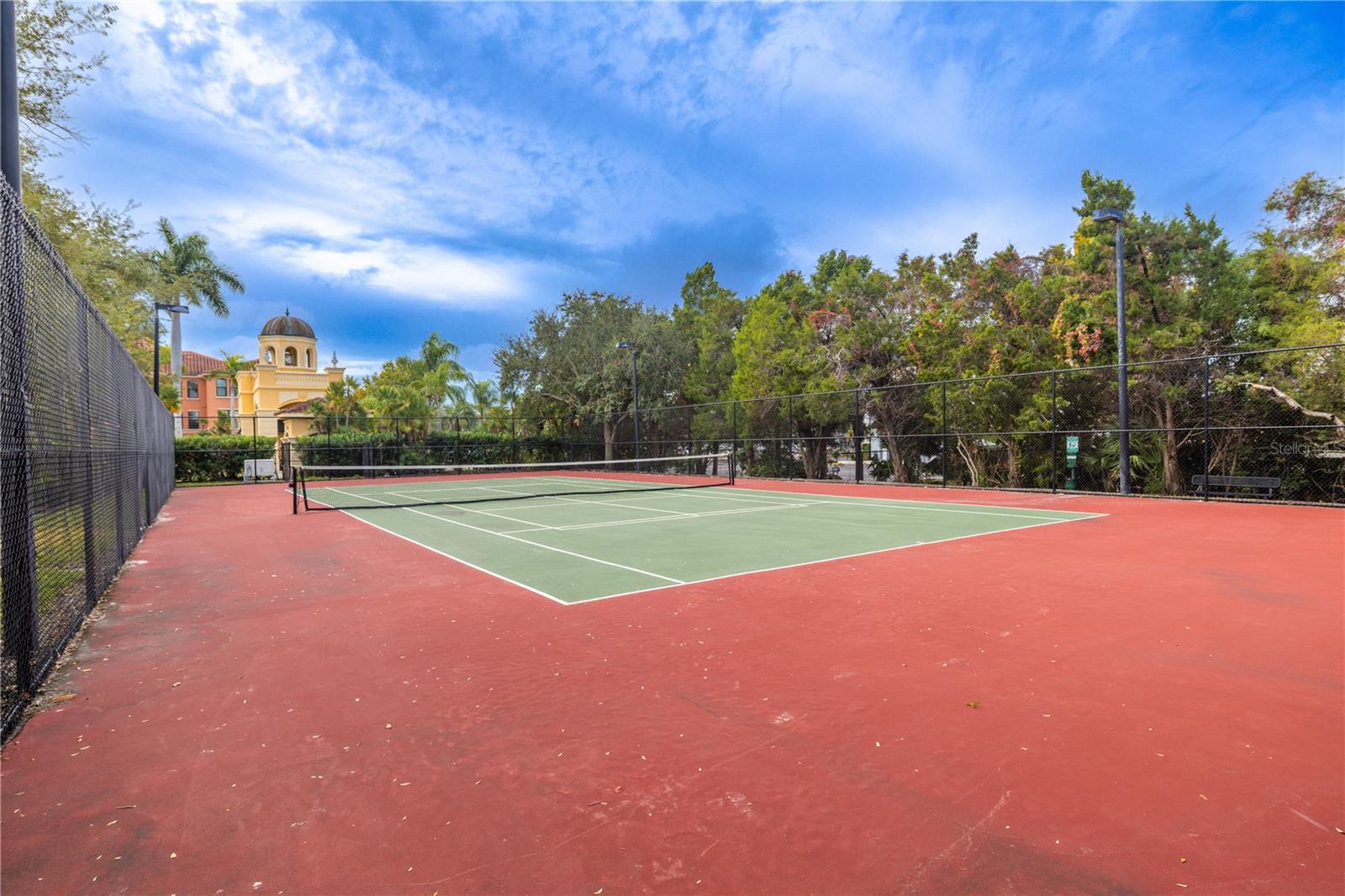 Angel ground view of the beautifully maintained tennis court.